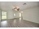 Bright living room featuring hardwood floors and neutral walls at 1638 Harmony Dr, Port Charlotte, FL 33952