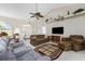 Relaxing living room featuring comfortable seating and high ceilings at 16407 San Edmundo Rd, Punta Gorda, FL 33955
