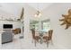Cozy kitchen nook with a small table and chairs, perfect for a quick meal at 16407 San Edmundo Rd, Punta Gorda, FL 33955