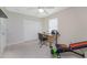 Functional home office with built in shelving and a desk at 16407 San Edmundo Rd, Punta Gorda, FL 33955