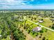 Aerial view showing home's location, lot size, and surrounding landscape at 16407 San Edmundo Rd, Punta Gorda, FL 33955
