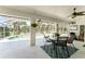 Spacious lanai with pool view and outdoor dining set at 16407 San Edmundo Rd, Punta Gorda, FL 33955