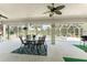 Relaxing screened-in patio with pool view, perfect for dining al fresco at 16407 San Edmundo Rd, Punta Gorda, FL 33955