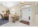 Spacious entryway with decorative console table and adjacent dining area at 16407 San Edmundo Rd, Punta Gorda, FL 33955