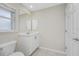 Simple bathroom with white vanity and toilet at 16407 San Edmundo Rd, Punta Gorda, FL 33955