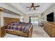 Bright Primary bedroom featuring a king-size bed and sliding glass doors at 16407 San Edmundo Rd, Punta Gorda, FL 33955