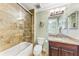 Bathroom with tub, shower, and granite vanity at 89 Vivante Blvd # 305, Punta Gorda, FL 33950