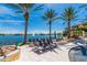 Relaxing lounge chairs overlooking a lake at 89 Vivante Blvd # 305, Punta Gorda, FL 33950