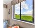 Stunning view of the water from a large window at 89 Vivante Blvd # 305, Punta Gorda, FL 33950