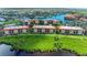 Condos with water views, lush landscaping and tennis courts at 89 Vivante Blvd # 305, Punta Gorda, FL 33950