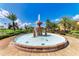 Ornate fountain in a landscaped area at 89 Vivante Blvd # 305, Punta Gorda, FL 33950
