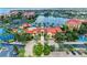Community clubhouse and pool with tennis courts nearby at 89 Vivante Blvd # 305, Punta Gorda, FL 33950