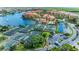Aerial view of tennis courts and resort-style pool area at 89 Vivante Blvd # 305, Punta Gorda, FL 33950