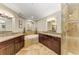 Double vanity bathroom with a large soaking tub and shower at 89 Vivante Blvd # 305, Punta Gorda, FL 33950