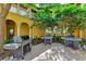 Outdoor grilling area with multiple grills at 89 Vivante Blvd # 305, Punta Gorda, FL 33950