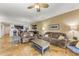 Spacious living room with tiled floors and comfortable seating at 89 Vivante Blvd # 305, Punta Gorda, FL 33950