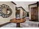 Elegant hallway with ornate mirror and table at 89 Vivante Blvd # 305, Punta Gorda, FL 33950