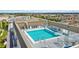 Elevated rooftop pool with surrounding patio at 1500 Park Beach Cir # 2F, Punta Gorda, FL 33950