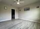 Neutral toned bedroom with laminate floors, ceiling fan, and recessed lighting at 25168 E Lenox Cir, Punta Gorda, FL 33950