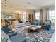 Inviting clubhouse lounge area with stylish seating, a cozy atmosphere, and plenty of room for socializing at 25168 E Lenox Cir, Punta Gorda, FL 33950
