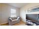 Comfortable living room with sofa, TV, and a view to the outside at 25168 E Lenox Cir, Punta Gorda, FL 33950