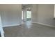 Spacious living area with tile floors and lots of natural light at 8347 Ada St, Port Charlotte, FL 33981