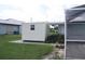 Ample storage with a backyard shed and screened enclosure at 305 W Tarpon Nw Blvd, Port Charlotte, FL 33952