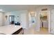 Hallway with access to laundry room and other rooms at 25168 E Lenox Cir, Punta Gorda, FL 33950