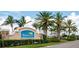 Waterford community entrance sign with palm trees at 25168 E Lenox Cir, Punta Gorda, FL 33950