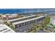 Aerial view of waterfront condo community with parking and pool at 150 Harborside Ave # 216, Punta Gorda, FL 33950