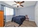 Comfortable bedroom with a double bed and wood floors at 150 Harborside Ave # 216, Punta Gorda, FL 33950