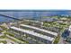 Aerial view of waterfront condo community with pool and parking at 150 Harborside Ave # 216, Punta Gorda, FL 33950
