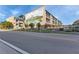 Building exterior showcasing unique mural and landscaping at 150 Harborside Ave # 216, Punta Gorda, FL 33950