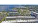 Aerial view of waterfront condo community with pool and parking at 150 Harborside Ave # 216, Punta Gorda, FL 33950