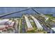 Aerial view of waterfront condo community with pool and parking at 150 Harborside Ave # 216, Punta Gorda, FL 33950