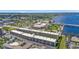 Aerial view of waterfront condo community near a bridge and performing arts center at 150 Harborside Ave # 216, Punta Gorda, FL 33950