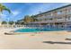 Refreshing community pool with lounge chairs, ready for relaxation at 150 Harborside Ave # 216, Punta Gorda, FL 33950