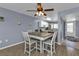 Condo dining area with table and chairs, open to kitchen at 150 Harborside Ave # 216, Punta Gorda, FL 33950