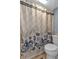 Bathroom with a shower/tub and nautical-themed shower curtain at 150 Harborside Ave # 216, Punta Gorda, FL 33950