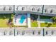 Aerial view showing the community pool and shuffleboard court at 150 Harborside Ave # 216, Punta Gorda, FL 33950