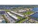 Aerial view of waterfront condo community with pool and parking at 150 Harborside Ave # 216, Punta Gorda, FL 33950