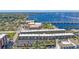 Aerial view of waterfront condo building with parking and water access at 150 Harborside Ave # 216, Punta Gorda, FL 33950