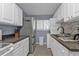 Full condo kitchen with stainless steel appliances and granite counters at 150 Harborside Ave # 216, Punta Gorda, FL 33950