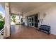 Building entrance with benches and glass doors leading to the lobby at 200 Harbor Walk Dr # 243, Punta Gorda, FL 33950