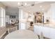 Open concept kitchen boasts white shaker cabinets, granite countertops, and stainless steel appliances at 200 Harbor Walk Dr # 243, Punta Gorda, FL 33950