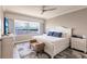 Bright bedroom with a king-size bed and waterfront views at 200 Harbor Walk Dr # 243, Punta Gorda, FL 33950