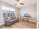 Comfortable home office with sofa, desk and hardwood floors at 200 Harbor Walk Dr # 243, Punta Gorda, FL 33950
