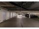 Well-lit parking garage with multiple parking spots at 200 Harbor Walk Dr # 243, Punta Gorda, FL 33950