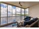 Relaxing waterfront view from screened balcony with seating at 200 Harbor Walk Dr # 243, Punta Gorda, FL 33950
