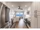 Modern kitchen with white cabinets, stainless steel appliances, and water views at 200 Harbor Walk Dr # 243, Punta Gorda, FL 33950